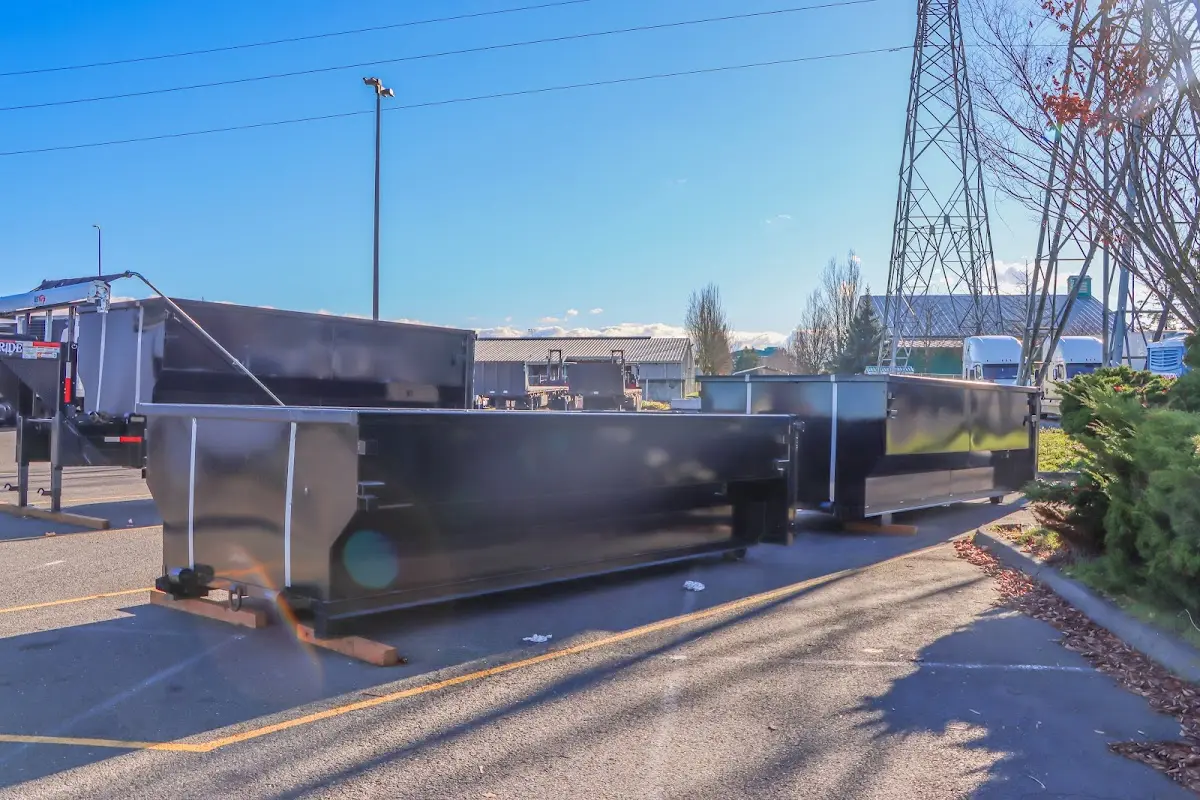 Roll-off dumpster ready for waste disposal at job site for 2 Yard Dumpster Rental in Dallas